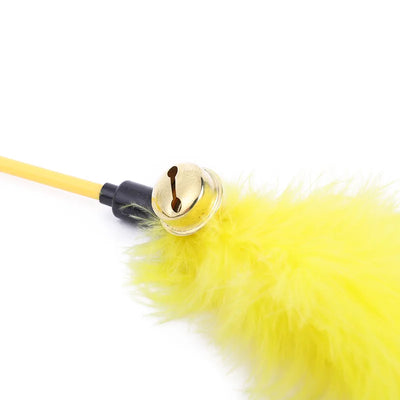 Cat teaser wand with yellow feather and attached bell. cat feather wand