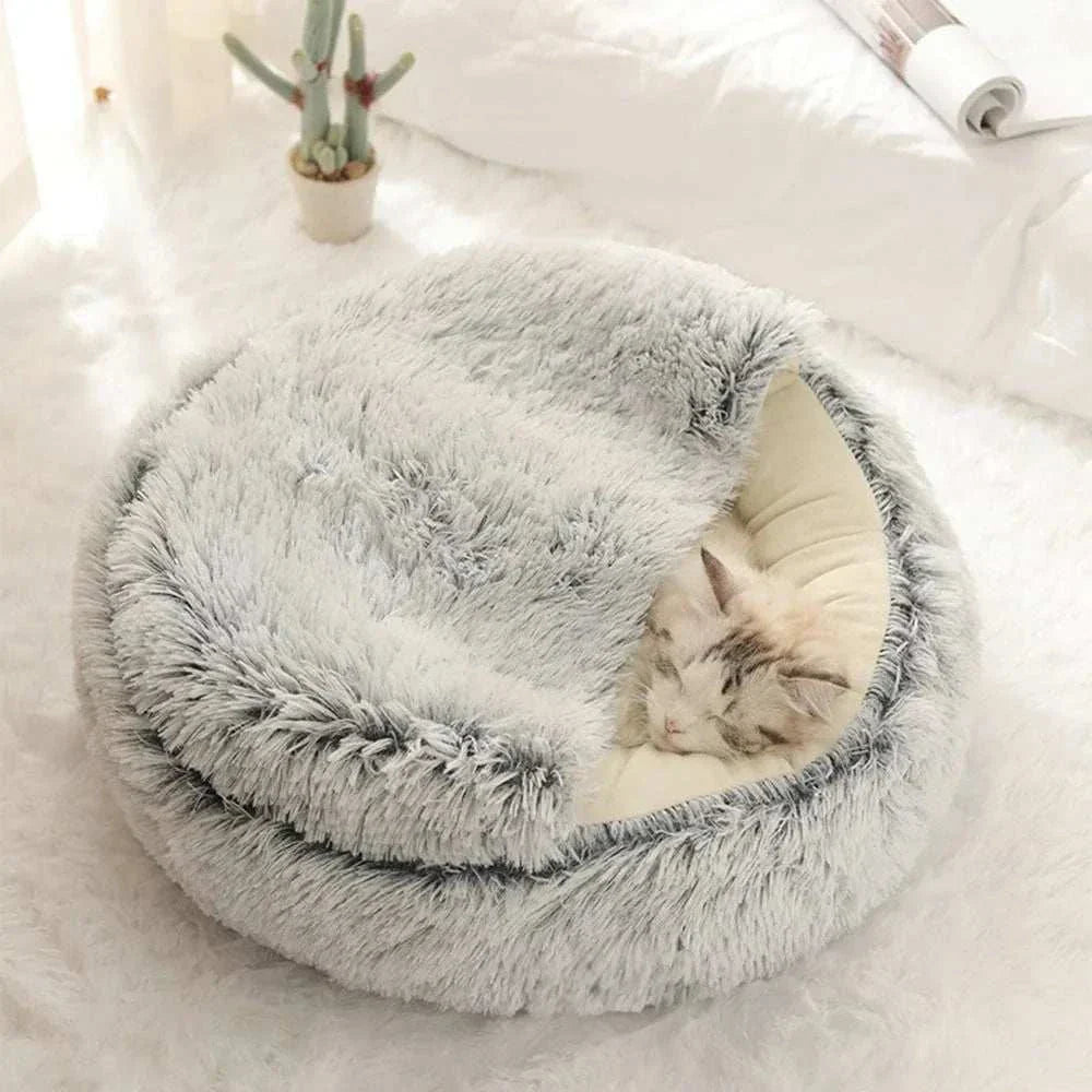 Warm plush round pet bed for cats and small pets, eco-friendly design. Warm Pet Bed