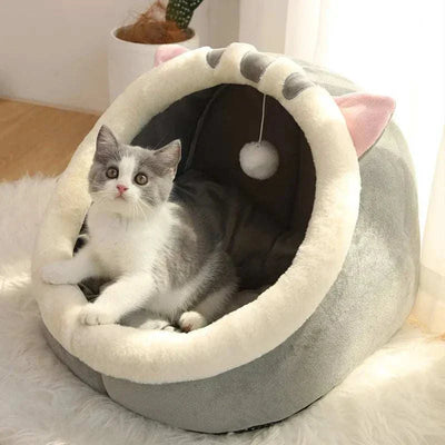 Self-warming foldable pet tent bed for cats, made of 100% cotton, in a cozy indoor setting. Dog tent bed