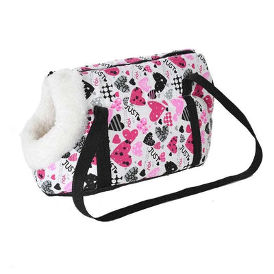 Portable dog backpack carrier with pink and black heart pattern for small pets.