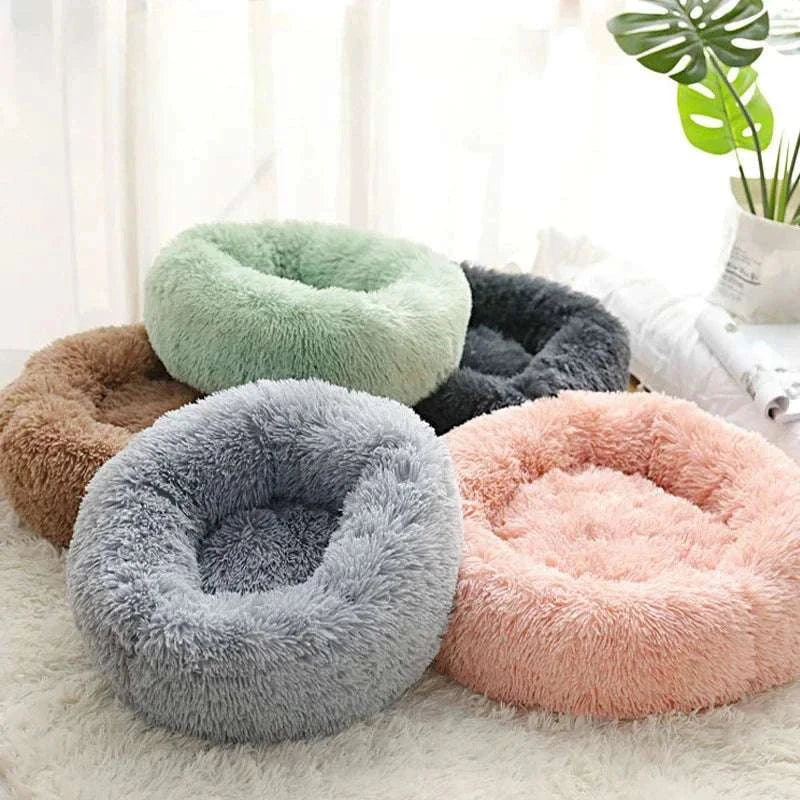 Home Plush Pet Nest with soft, warm, round design in various colors for cats and small dogs. washable dog bed