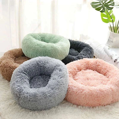 Home Plush Pet Nest with soft, warm, round design in various colors for cats and small dogs. washable dog bed