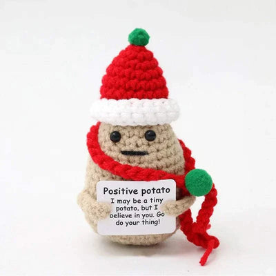 Handwoven crochet duck ornament with Santa hat and scarf, promoting positive energy.