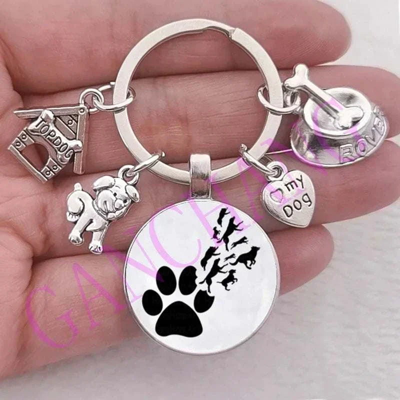 Cute dog keychain with glass pendant and various charms, antique silver plated.