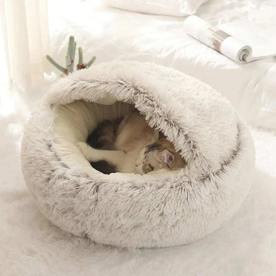 Warm plush round pet bed for cats and small pets, eco-friendly material. Warm Pet Bed