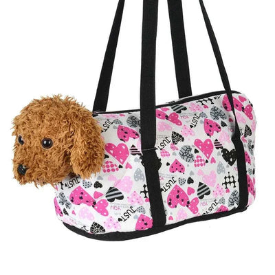 Portable dog backpack carrier with pink heart pattern, designed for small dogs and cats, eco-friendly, windproof, and breathable canvas material.