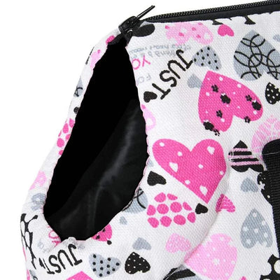 Portable dog backpack carrier with pink love heart pattern, eco-friendly and breathable canvas material.