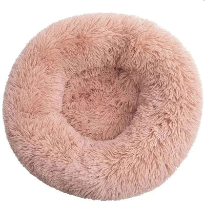 Plush round pet bed for cats and dogs in corduroy material.