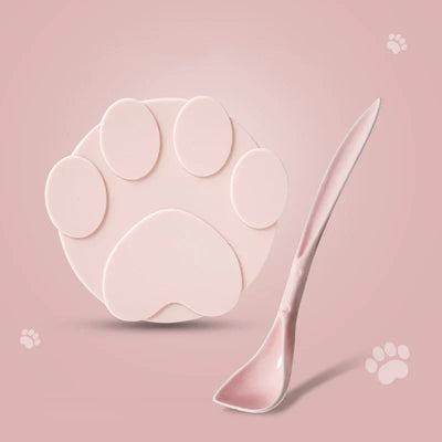 Portable silicone pet food lid and spoon set in pink paw design. Pet Food Lid and Spoon