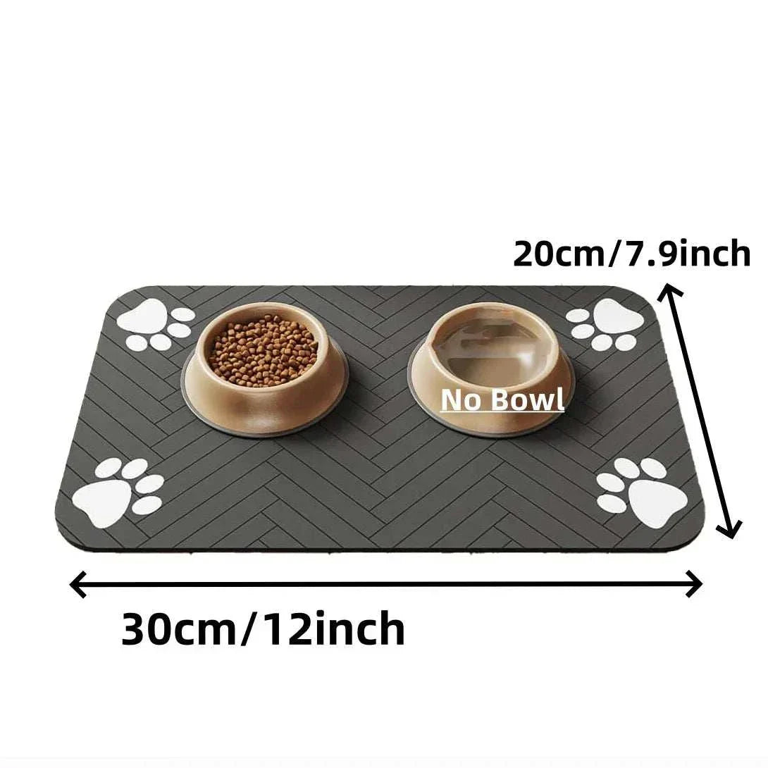 Absorbent dog feeding mat, waterproof quick-dry placemat with food and water bowls, 30x20 cm, black with paw prints.