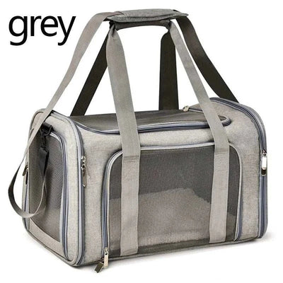 Grey dog cat carrier bag with breathable mesh design, airline-approved for small pets.