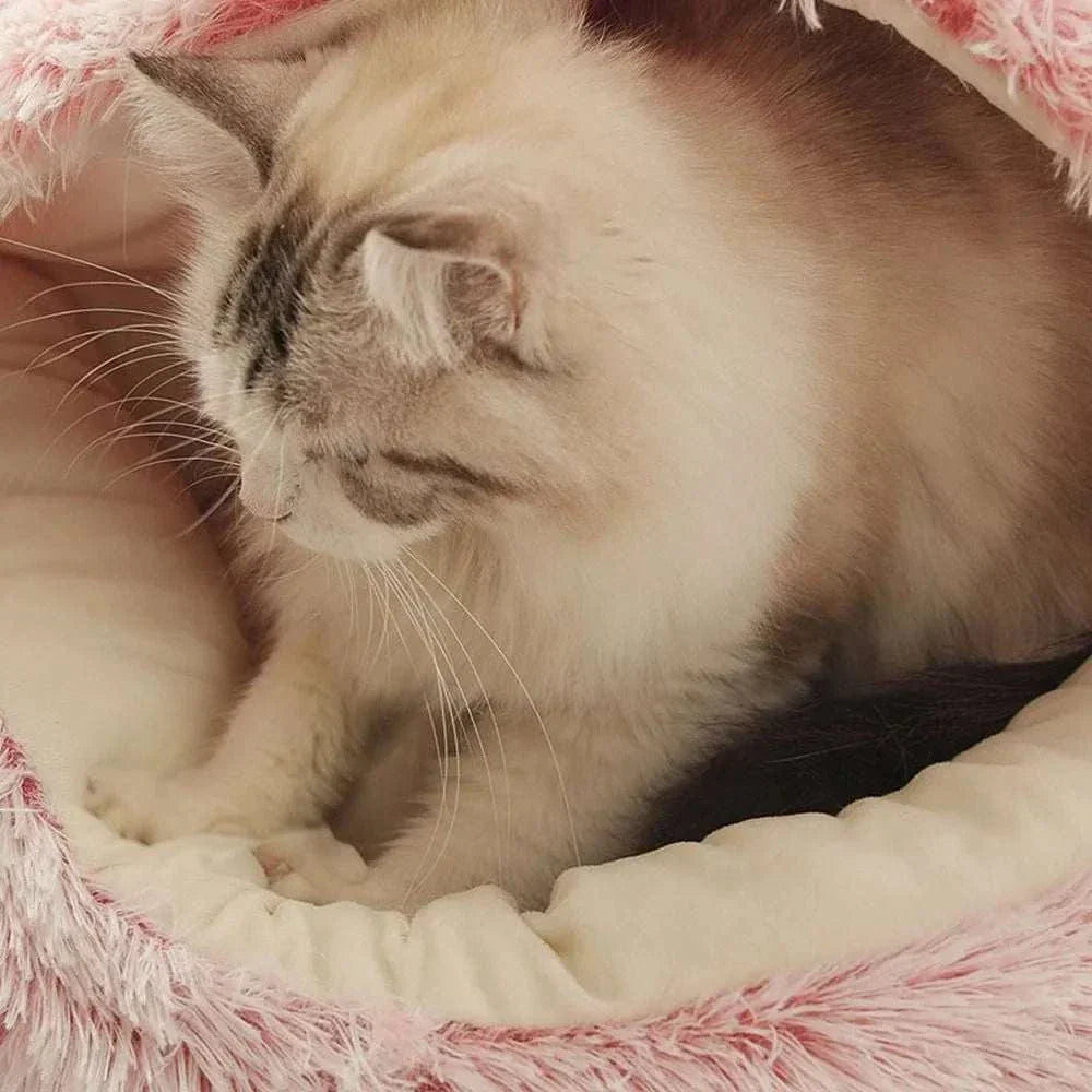 Warm plush round pet bed with cat resting inside.