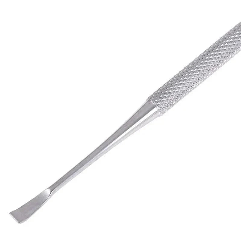 Stainless steel pet tooth scraper for dog oral care.