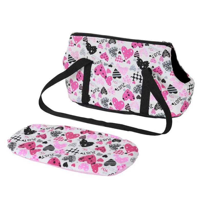 Portable dog backpack carrier with pink heart and striped pattern, ideal for small dogs and cats, eco-friendly and breathable.