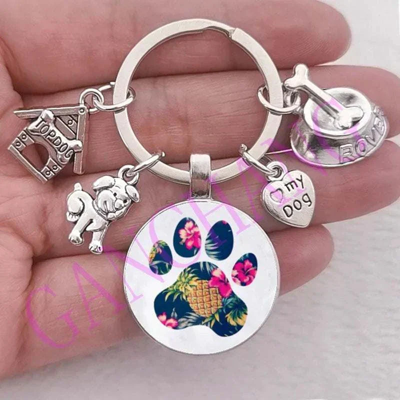 Cute Dog Paw Keychain with Glass Pendant, antique silver plated, trendy design.