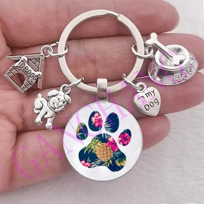 Cute Dog Paw Keychain with Glass Pendant, antique silver plated, trendy design.