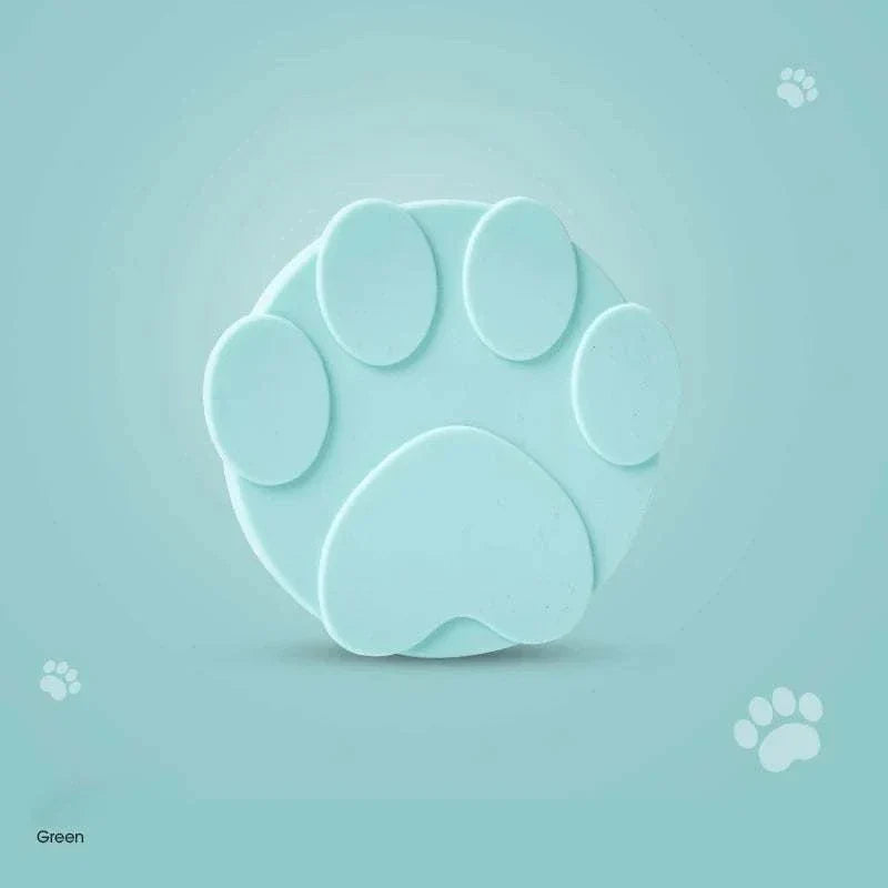 Portable silicone pet food lid and spoon with paw design in green, 2-in-1 sealer for cans and bowls. Pet Food Lid and Spoon