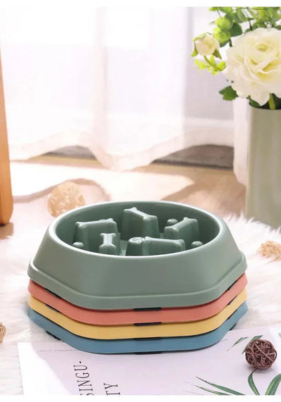 Slow feeder bowl for small and medium dogs, multi-color stack of plastic bowls, designed to promote healthy eating. cat slow feeder