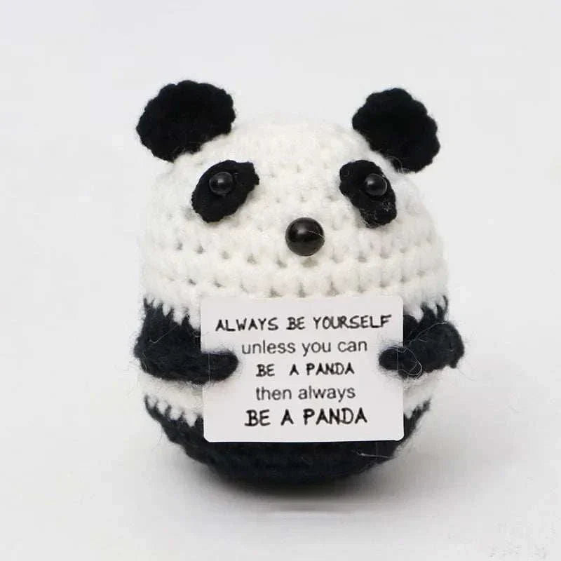 Handwoven crochet panda ornament with motivational sign.