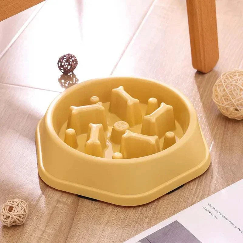 Slow feeder bowl for small and medium dogs made of plastic in a yellow design. cat slow feeder