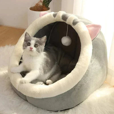 Self-warming foldable pet tent bed for cats and small dogs made of 100% cotton.