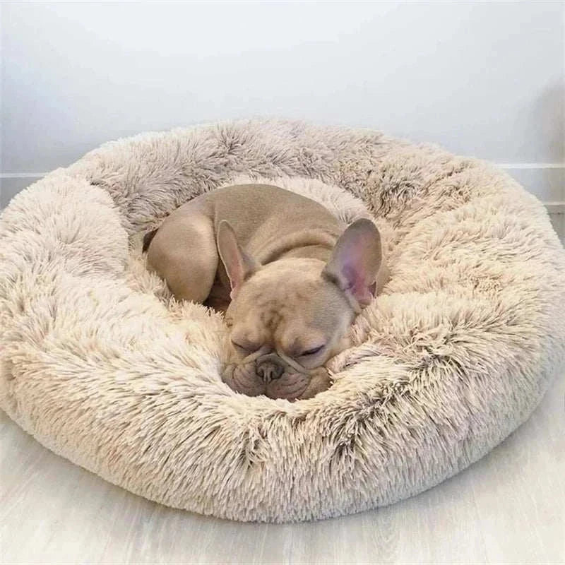 Plush round pet bed for cats and dogs in solid corduroy, eco-friendly and machine washable.